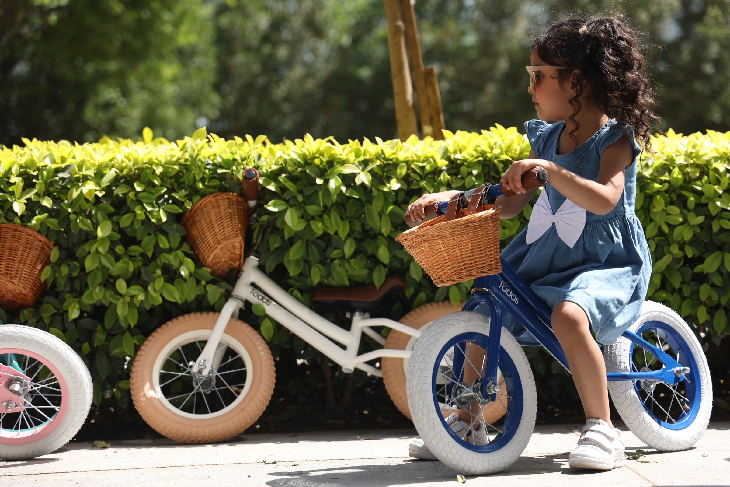 Kid riding balance bike